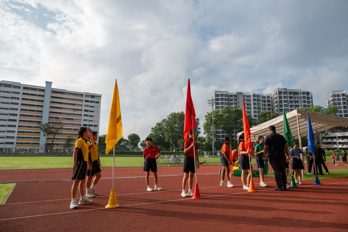 Students preparing for a track and field event.